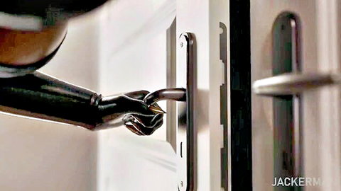 Selina's latex-gloved hand teasing door handle in futa sabotage scene