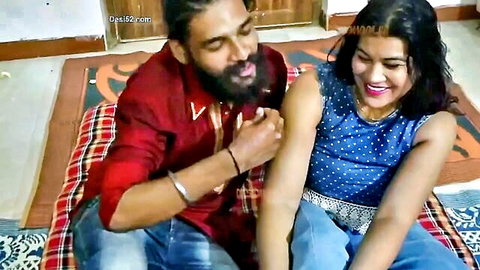 Indian couple foreplay: bearded man touches smiling woman's arm in amateur orgy preview
