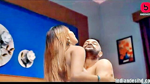 Nude Indian woman with big tits embraced and groped by older South Asian man from behind in taboo sex scene