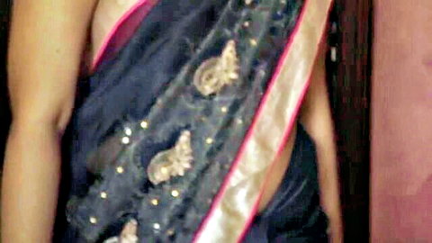 Indian BBW in sheer black saree teasing big tits and curvy ass
