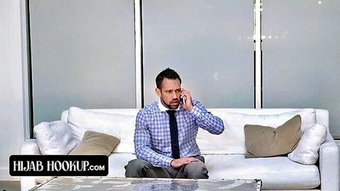 Ella Knox in hijab teases on couch for Hijab Hookup blowjob scene