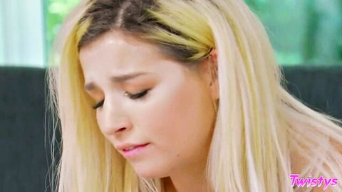Blonde beauty with long hair shows ecstatic orgasm face closeup