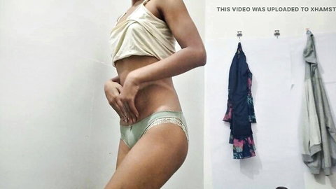 Slim Indian teen in lace panties and tank top, hand on crotch seductively