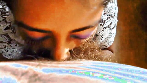 Hot Indian babe in lace veil giving closeup blowjob