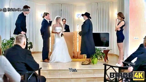 Blonde bride in white wedding dress at cheating ceremony altar with suited men and groomsmen