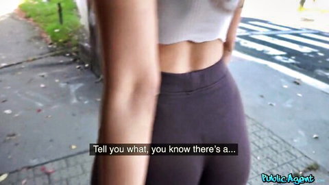 Marina Maya in tight white top and purple leggings, teasing from behind in public