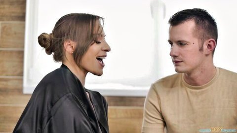 Josephine Jackson in black robe smiles intimately with Sam Bourne in European stepmom scene