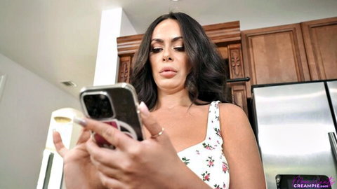 Kiki Klout sexy Latina stepmom in floral sundress holding phone