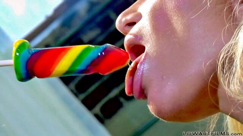 Shyla Stylez seductively licks rainbow phallic lollipop in lesbian tease