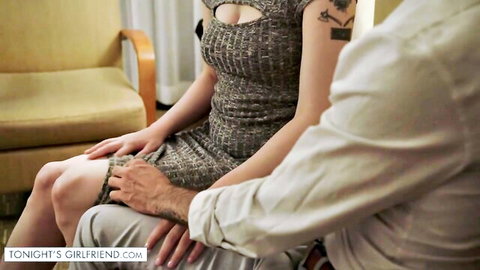 Bree Daniels in sexy dress sitting on man's lap in intimate encounter