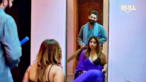 Indian BBW in sexy purple saree showing cleavage in hot series scene
