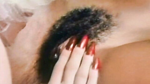 Desiree Lane's red-nailed hand on trimmed pussy in vintage lesbian action with Shanna Evans