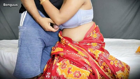 Hot Indian MILF housewife in red sari gets penetrated doggy style by lover