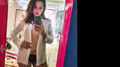Brunette amateur in open white blouse exposing breasts mirror selfie