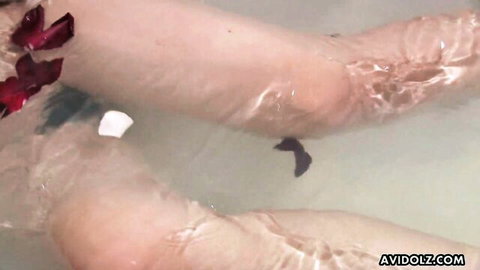 Mirai Haneda in steamy bathtub sex with rose petals, wet legs