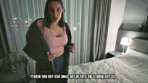 Seductive brunette stepmom in hotel, pink top and jacket, wine glass tease