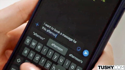 Hand typing erotic massage booking message for young Russian blonde pussy foreplay on phone