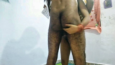 Hairy Desi man stands naked as woman grabs his cock in homemade sex