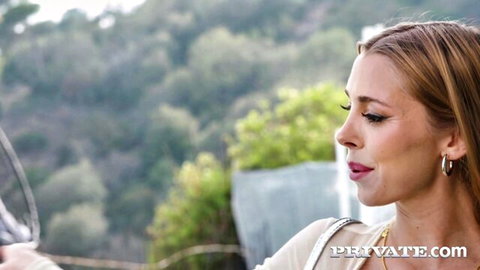 Sexy young blonde with plump lips and steamy gaze outdoors on Private.com
