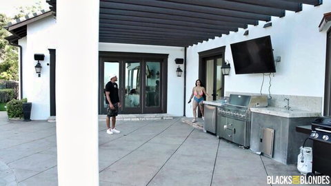 Payton Preslee's massive tits in bikini with black stud outdoors