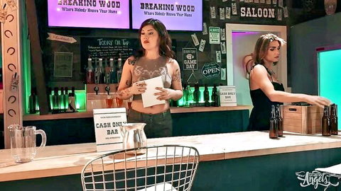 Daisy Taylor and tattooed friend in sexy bar outfits at Breaking Wood Saloon
