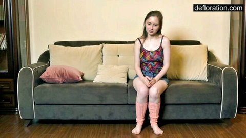 Petite Anna in colorful tank top, short shorts and pink thigh-highs, solo tease