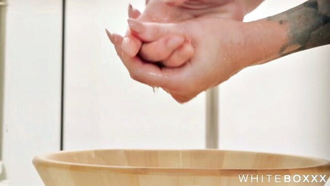 Sophia Locke oiled pussy spread close-up in wet hands