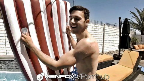 Darron Bluu muscular hunk in speedo on pool float, smiling POV tease