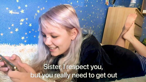 Purple-haired step-sister smiling on bed, caught texting in black top and shorts