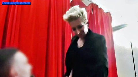 Blonde amateur with short hair in sexy black top gives public lapdance tease