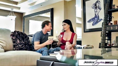 Jessica Jaymes in red dress chatting seductively with man