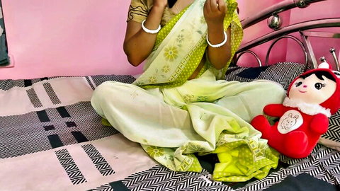 DesiSexCreator hot Bhabhi in green saree sitting seductively, teasing POV style