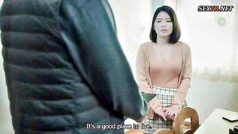 Asian woman in plaid skirt and cardigan chatting with man in apartment