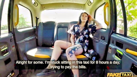 Sexy brunette in floral dress sits in taxi, craving wild ride