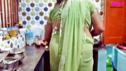 Curvy Desi bhabi in green saree, teasing from behind in kitchen