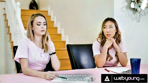Kyler Quinn and Kimmy Kimm in casual pink tops, intimate chat at table