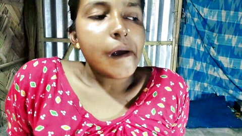 Sexy Indian woman in pink floral top with open mouth and glossy lips teasing blowjob