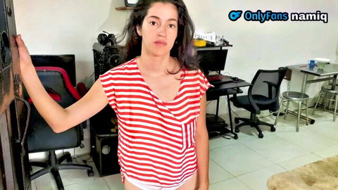 Sexy South Asian babe in striped top and white panties teasing cleavage and curves
