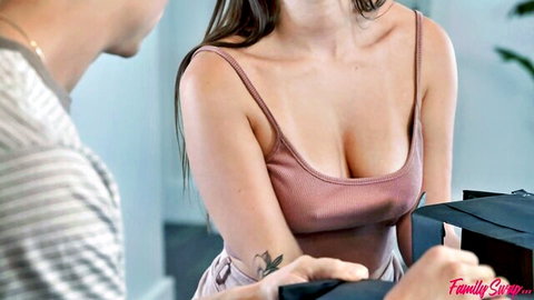 Sexy MILF in tight pink top with deep cleavage during intimate talk