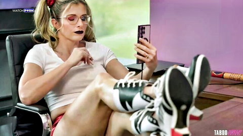 Blonde babe in tiny red shorts and crop top takes sexy office selfie showing legs and ass