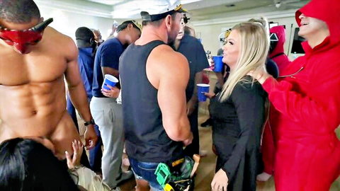 Halloween hotwife orgy thumbnail: nude muscular black men, costumed women in group sex party