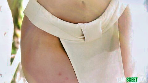 Violet Myers teasing in white hip wrap, curvy hips exposed