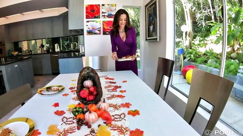 Lisa Ann in sexy purple dress at Thanksgiving table