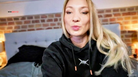 Fiona Fuchs blonde in seductive hoodie pout for POV dirty talk video
