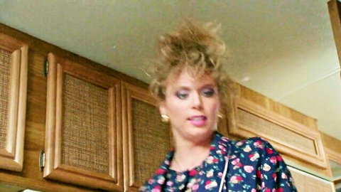 Retro big-haired blonde with huge natural tits teasing in floral nightgown cleavage