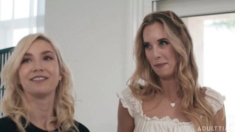 Blonde Claire Roos and Charlotte Sins in teasing white dress pose