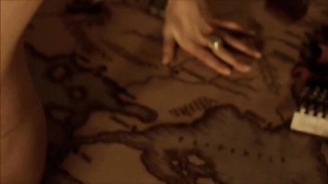 Sensual female hand caressing ancient map in erotic Rome beauty encounter