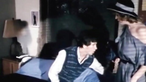 Vintage busty older woman with short hair in dress seduces man