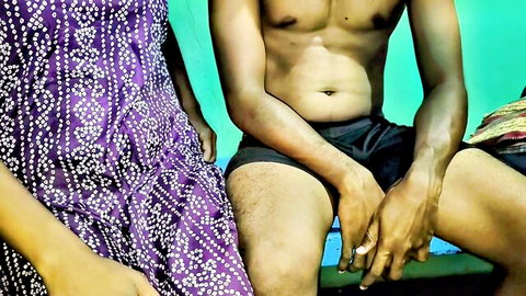 Tamil teen Amma Payan with big tits in purple dress beside shirtless man