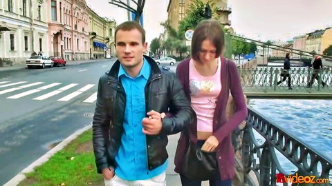 Angelic Anya in casual outfit walking with man on Russian street